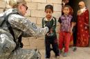 Soldier greeting children 