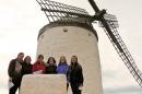 students in spain in front of windmill